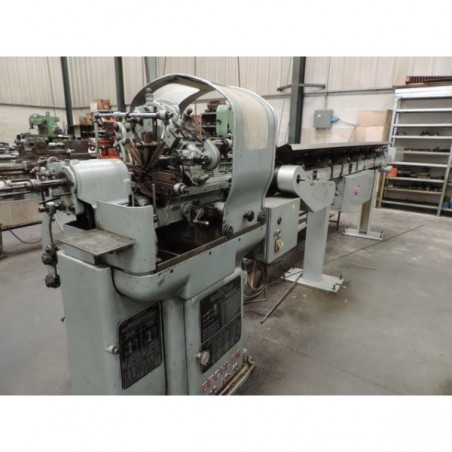 MOVING HEADSTOCK LATHE BECHLER AS-10 (With TRAUB automatic bar feeder)