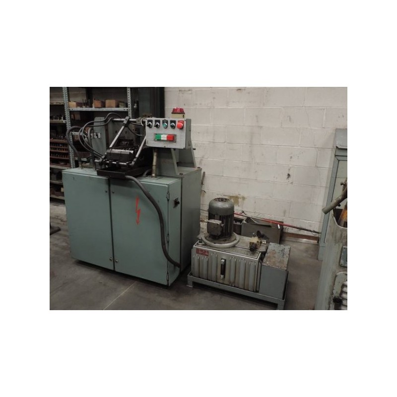 MAQUINA AUTOMATICA DE CLAVAR PUNCETAS A EJES